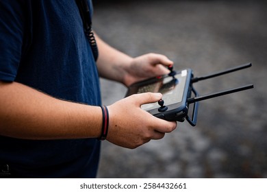 Man with drone remote controller