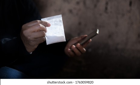 Man Is Drug Dealer. Man Call Up Sells The Drugs On Phone And He Is Addicted Drug Or Narcotic With Copy Space