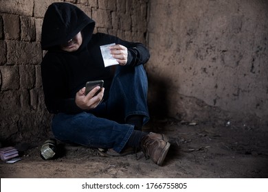Man Is Drug Dealer. Man Call Up Sells The Drugs On Phone And He Is Addicted Drug Or Narcotic With Copy Space