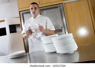 Man Drying Dishes