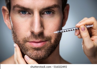 Man During Surgery Filling Facial Wrinkles
