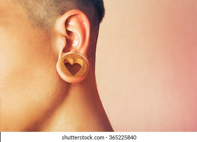 Man With Earlobe Hole. 