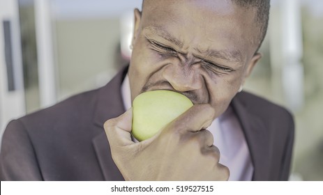 Man Eating Apple