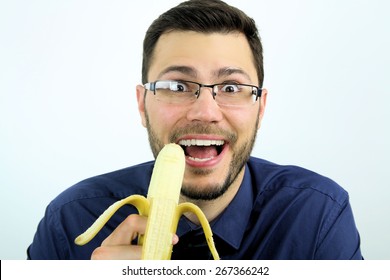 Man Eating A Banana