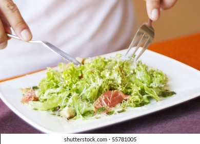 Man, Eating Caesar Salad With Salmon