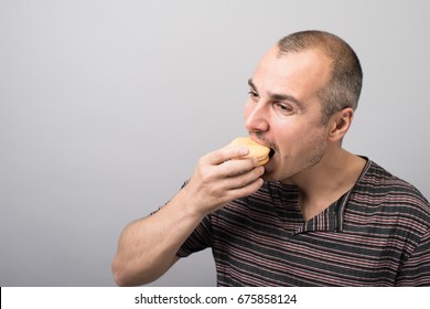 man eating cookies