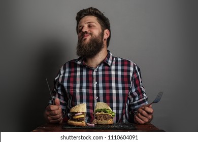 Man Eating Fresh Self Made Burger Close Up