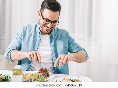 Man eating healthy food and drink detox juice - Powered by Shutterstock