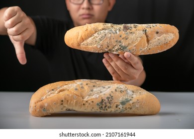 https://image.shutterstock.com/image-photo/man-eating-moldy-dirty-bread-260nw-2107161944.jpg