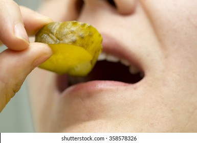 Man Eating Pickles