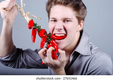 Man Eating Red Pepper