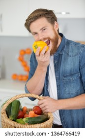 Man Eating A Row Pepper