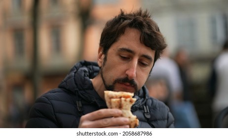 Man Eating Sandwich Outside Feeling Pleasure. Person Eat Food Snack Outdoors