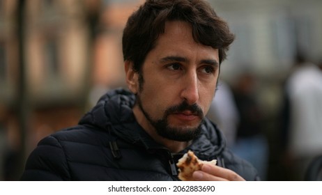 Man Eating Sandwich Outside Feeling Pleasure. Person Eat Food Snack Outdoors