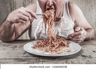 Man eating spaghetti, overeating adult.