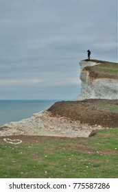 The man at the edge of the cliff