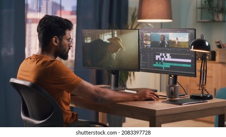 Man editing video on computer - Shutterstock ID 2083397728