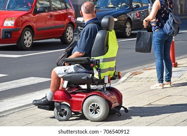 Man with an electric wheelchair