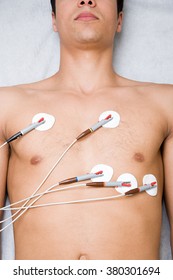 Man with electrodes on chest