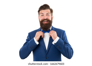 Man in elegant custom tailored expensive suit. Happy man in suit fixing tie. successful man smiling. stylish successful man in suit. classic mens clothes. male beauty and fashion. wedding tuxedo.