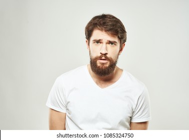 man, emotions, light background                              - Shutterstock ID 1085324750