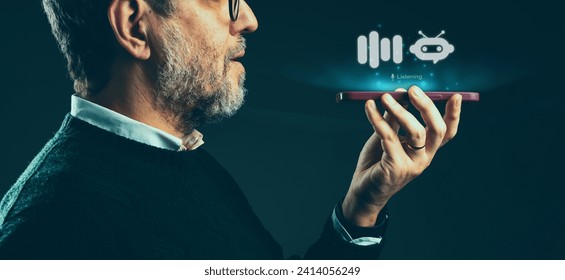 Man engages with smartphone's AI voice assistant, showcasing modern voice-activated technology. - Powered by Shutterstock