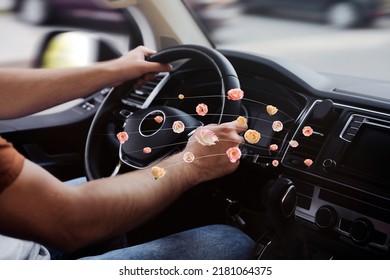 Man enjoying driving car feeling flower scent from ventilation, closeup. Air freshener