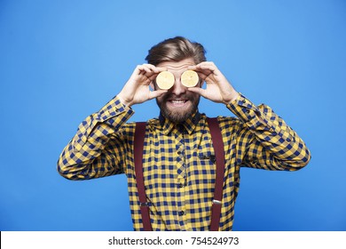 Man Enjoying With Fruit On Eyes