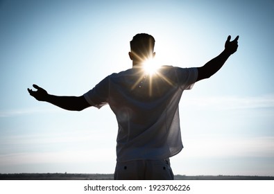 Man Enjoying Sunny Day, Back View. Nature Healing Power