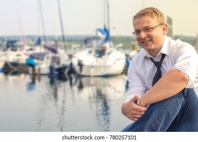 Man enjoys luxurious lifestyle at a sailing port - Shutterstock ID 780257101