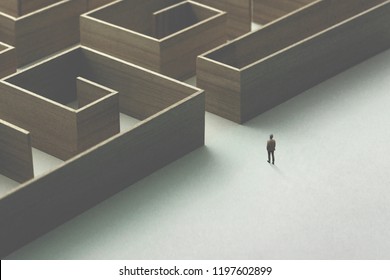 man entering wooden maze - Powered by Shutterstock