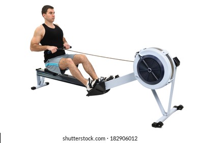 man exercising on rowing machine,  hands slightly blurred in motion - Powered by Shutterstock