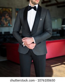 Man In Expensive Custom Tailored Tuxedo, Suit Posing Indoors