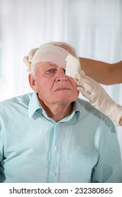 Man with eye bandage - Shutterstock ID 232380865