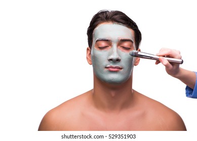 Man With Face Mask Being Applied On White