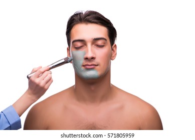 Man With Face Mask Being Applied On White