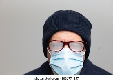 Man With Face Mask And Foggy Glasses Close Up With Copy Space. Horizontal 