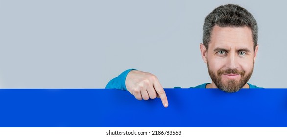 Man Face Portrait, Banner With Copy Space. Guy Make Announcement. Male Behind Paper Sheet. Place For Useful Information. Copy Space.