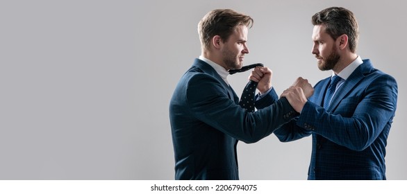 Man face portrait, banner with copy space. two angry businessmen fighting and arguing on businessmeeting have business competition, leadership.