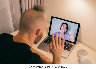 Man Facetime At Home, Calling His Friend Wife Girlfriend From Laptop In Bedroom.