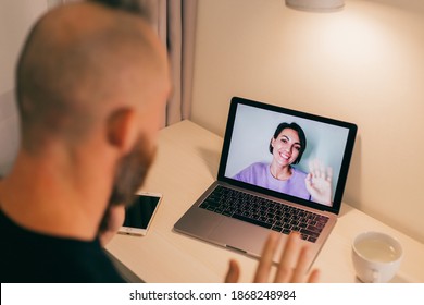 Man Facetime At Home, Calling His Friend Wife Girlfriend From Laptop In Bedroom.