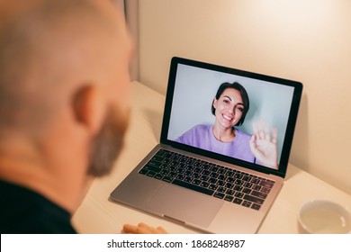 Man Facetime At Home, Calling His Friend Wife Girlfriend From Laptop In Bedroom.