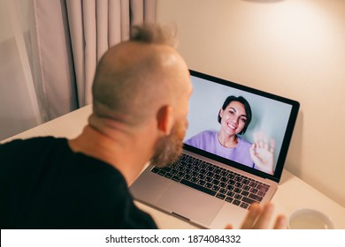 Man Facetime At Home, Calling His Friend Wife Girlfriend From Laptop In Bedroom.  