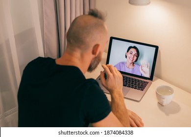 Man Facetime At Home, Calling His Friend Wife Girlfriend From Laptop In Bedroom.  