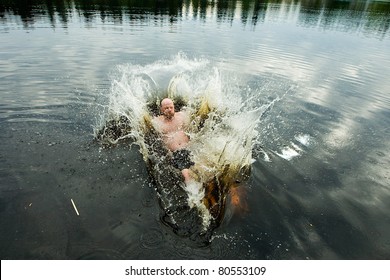 Man Falling Backwards Into A Lake.