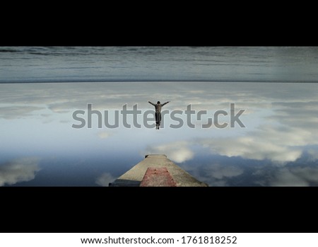 Similar – Hallig Gröde | Senior citizen stands in the calm North Sea at low tide and raises her hands to the sky