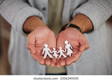 Man, family shape and hands in office, paper cutout and professional for investment in security. Male person, insurance agent and employee for finance assurance, savings protection and business - Powered by Shutterstock