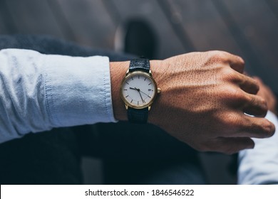 Man Fashionable Wearing Stylish Looking At Luxury Watch On Hand Check The Time At Workplace.concept For Managing Time Organization Working,punctuality,appointment