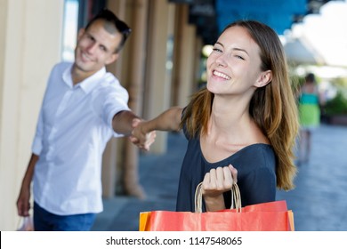 Man Fed Up With Wife Shopping In Shop