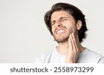 Man feeling pain in jaw. Dental health and care, free space